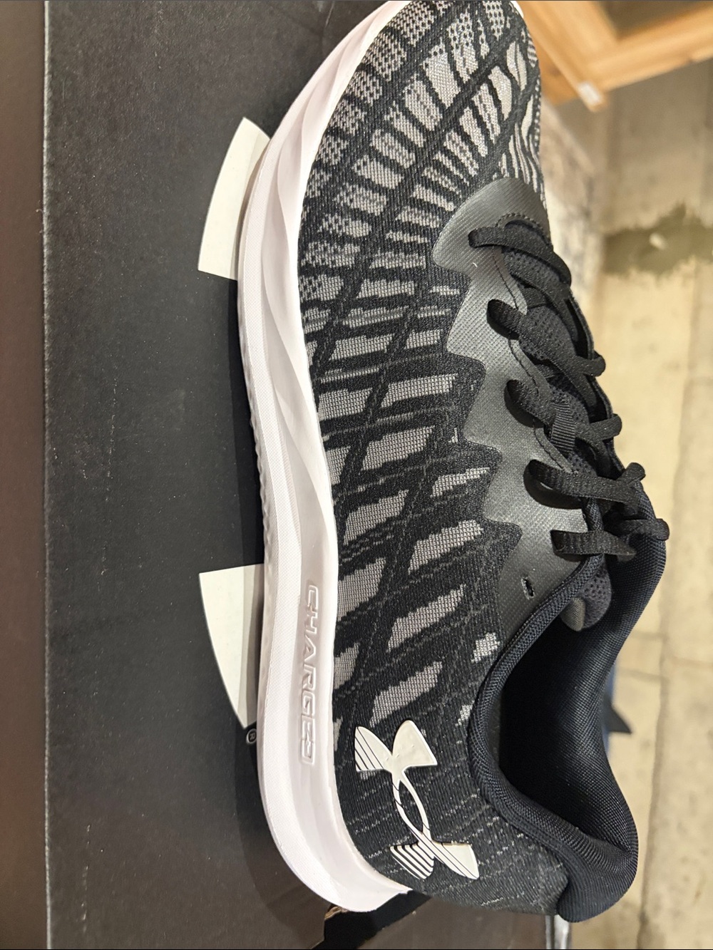 Under Armour Men’s Black and Gray Charged Cushioning Running Shoe